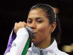 Conade publicó una fotografía de la mexicana Briseida Acosta, quien ganó la primera medalla de plata en Singapur. ESPECIAL  /