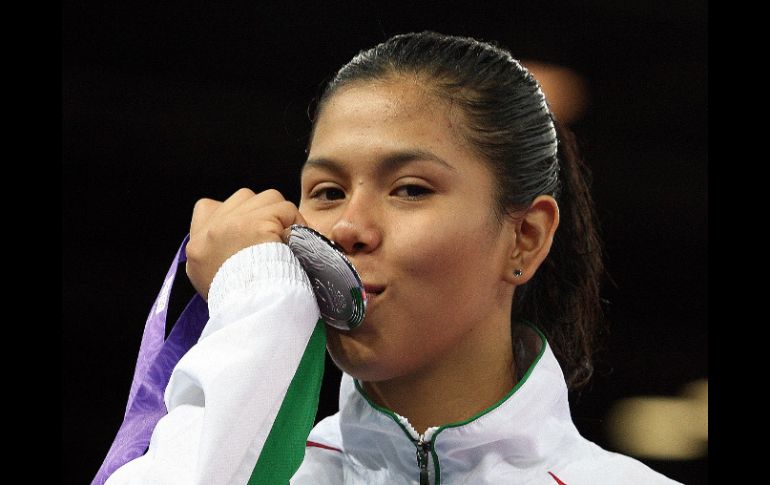 Conade publicó una fotografía de la mexicana Briseida Acosta, quien ganó la primera medalla de plata en Singapur. ESPECIAL  /