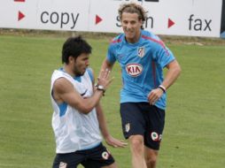 Diego Forlán realiza un entrenamiento con el Atlético de Madrid. EFE  /