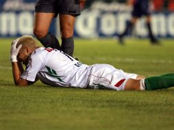 Adolfo Bautista lamenta una jugada en la derrota del Guadalajara. MEXSPORT  /