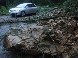 En Oaxaca, el paso del huracán ocasionó el deslave de algunos cerros y daños en carreteras. NTX  /