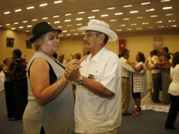 El festejo del Día del Pensionado se llevó a cabo ayer, con una comida en Expo Guadalajara. M. FREYRIA  /