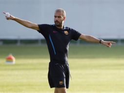 Pep Guardiola durante el entrenamiento del Barcelona. REUTERS  /