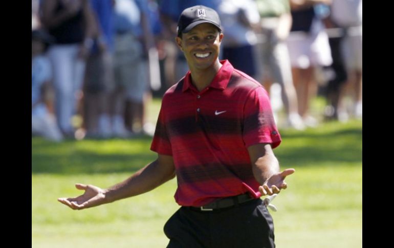 Tiger Woods se muestra contento por estar al frente de la clasificación mundial. REUTERS  /