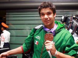 El pentatleta tapatío Abraham Camacho ya está de regreso en Guadalajara con la de bronce. MEXSPORT  /