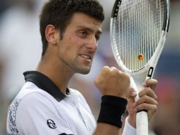 El tenista serbio Novak Djokovic celebra su sufrido triunfo. AFP  /