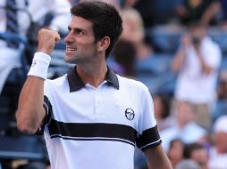 El tenista serbio Novak Djokovic feliz por el triunfo ante Gael Monfils. AFP  /