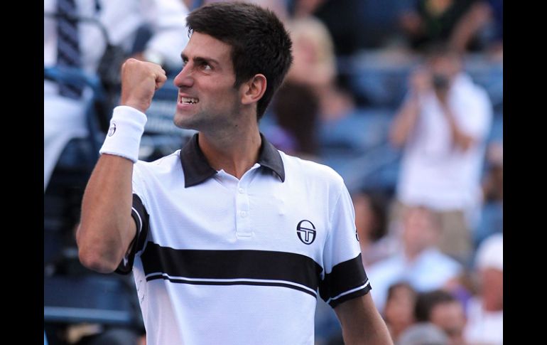 El tenista serbio Novak Djokovic feliz por el triunfo ante Gael Monfils. AFP  /