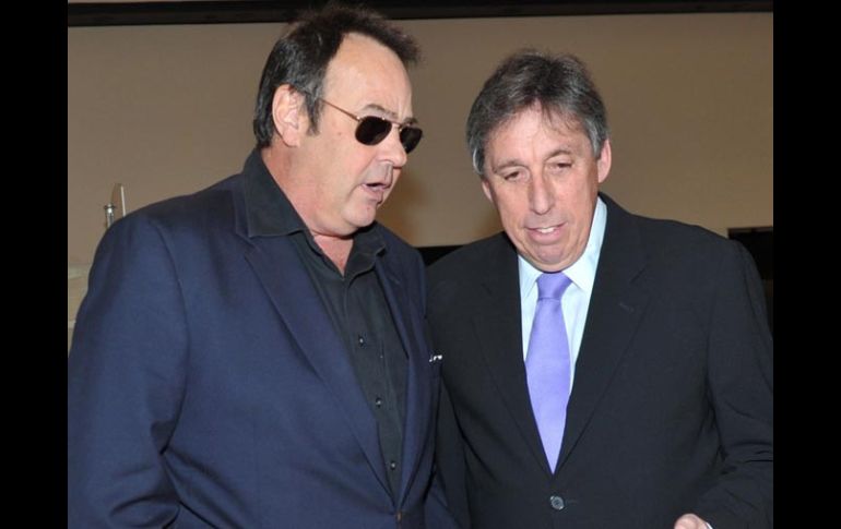 El actor Dan Aykroyd y el director Ivan Reitman. AFP  /