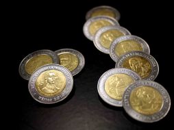 La edición especial de monedas de cinco pesos alcanzan hasta los 200 pesos en el mercado virtual. A. HINOJOSA  /