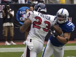 Arian Foster número 23 de Houston marcando una nueva anotación para su equipo. AP  /