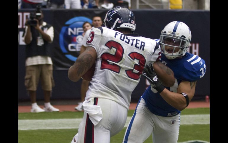 Arian Foster número 23 de Houston marcando una nueva anotación para su equipo. AP  /