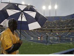 La lluvia apreció en Nueva york y evito que se jugarpa la final del US Open. AP  /