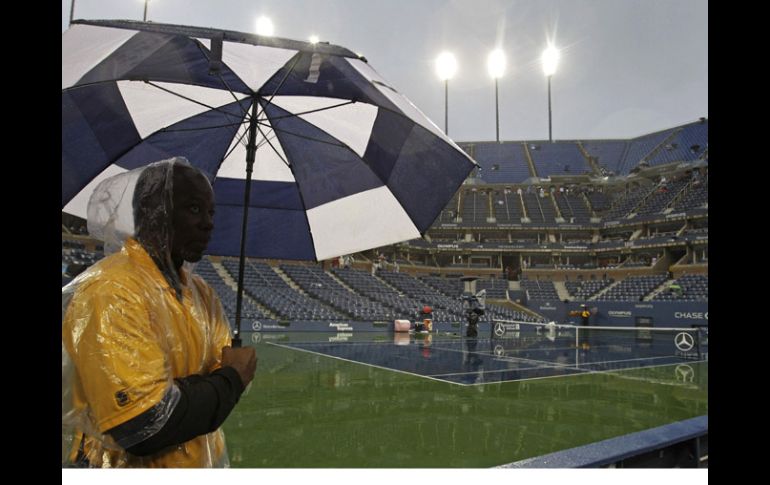 La lluvia apreció en Nueva york y evito que se jugarpa la final del US Open. AP  /