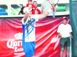 Vasek Pospisil celebra luego de conquistar el Abierto de Tenis. E. PACHECO  /