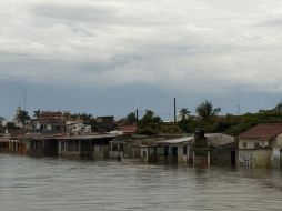 El Río Papaloapan afecta 95% de Tlacotalpan, Veracruz. Hay 25 víctimas y casi un millón de personas damnificadas en el Sureste. AFP  /