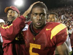 Reggie Bush (der.) cuando jugaba con los Troyanos de USC. AP  /