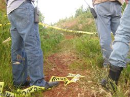 La brecha donde se hallaron los cuerpos está a unos cuantos metros de la carretera. O. RUVALCABA  /