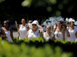 Como todos los domingos, las Damas de Blanco marcharon en las calles de La Habana. AP  /