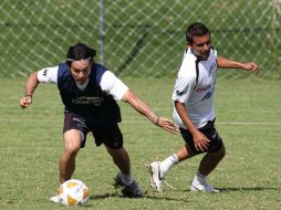 Gerardo Espinoza (izquierda) durante una sesión de entrenamiento. MEXSPORT  /