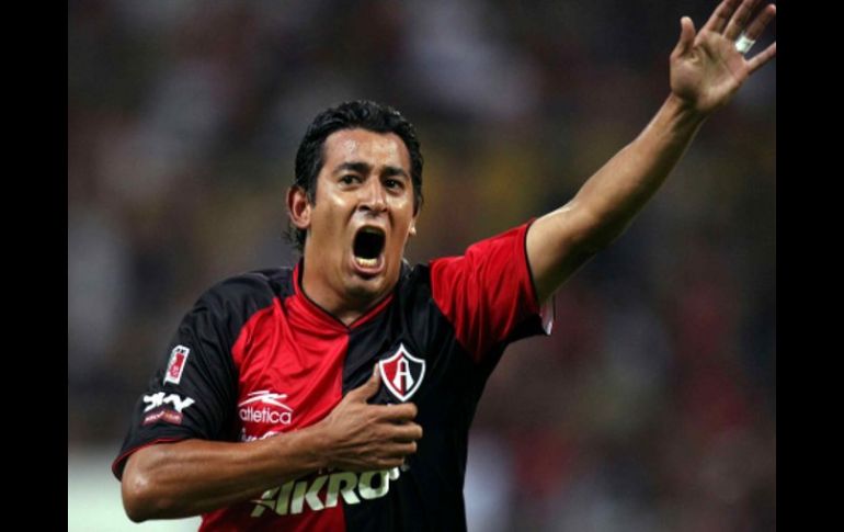 Alfredo Moreno festejando su gol con lo que el Atlas alcanzó la victoria. AFP  /