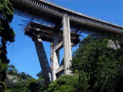 El director general del Banco de Obras anunció la ampliación de la carretera  durante la inauguración del Puente El Tapón.. ESPECIAL  /