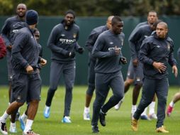 Los jugadores del Manchester City se preparan para enfrentar al Juventus. AP  /