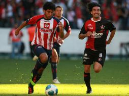 Gerardo Espinoza (der.) aseguró que la cancha de pasto sintético no debe ser ningún pretexto para Atlas. MEXSPORT  /