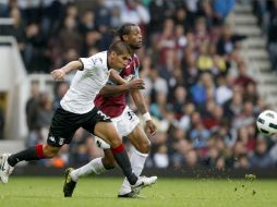 El timonel resalta la diferencia marcada en el Fulham por el delantero mexicano. AP  /