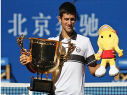 Novak Djokovic consiguió la victoria en el Abierto de China. AP  /