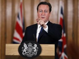 David Cameron en una conferencia de prensa en Downing Street sobre el caso Norgrove el día de hoy. AP  /