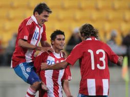 Los jugadores de Paraguay festejando su victoria ante Nueva Zelanda. AFP  /