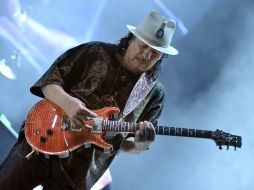 En su nuevo álbum, Santana se hace acompañar de cantantes como Chris Cornell y Scott Weiland. AFP  /