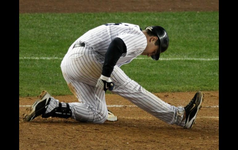 Mark Teixeira se quedó lesionado y es uan baja sensible para los Yankees. AFP  /