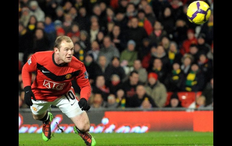 Rooney, por fin, se convence de su actual equipo y se queda hasta 2015. AFP  /