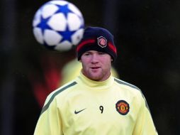 Wayne Rooney no podrá entrar a la cancha en el siguiente partido del ManU debido a una lesión en el tobillo. AFP  /