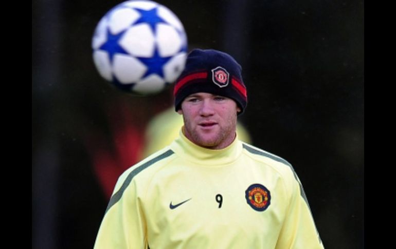 Wayne Rooney no podrá entrar a la cancha en el siguiente partido del ManU debido a una lesión en el tobillo. AFP  /