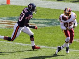 Santana Moss (89) recibe un pase en la zona de anotación para la causa de los Piles Rojas. AP  /