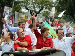 Lula y Rousseff pasean por Río de Janeiro. AFP  /