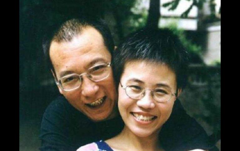 El Premio  Nobel de la Paz, Liu Xiaobo, posa junto a su esposa Liu Xia, en Beijing. NTX  /