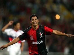 El jugador del Atlas festejando el buen partido que desempeñó ante el Atlante. MEXSPORT  /