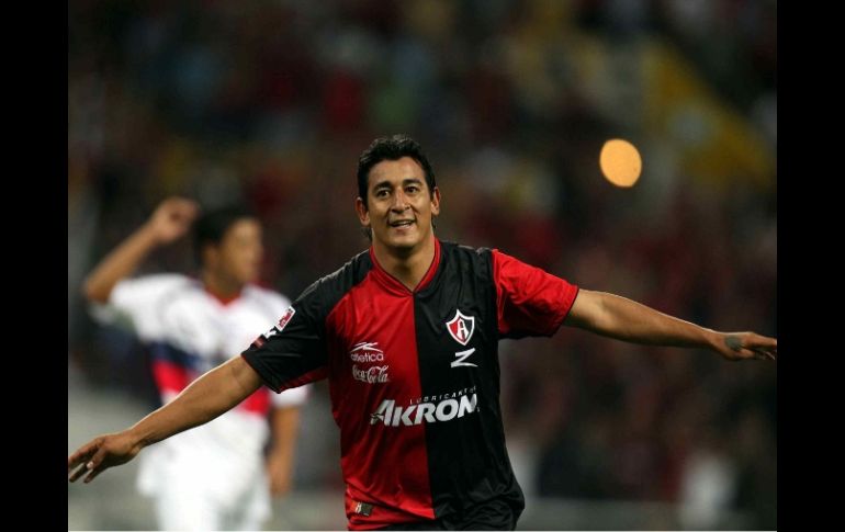 El jugador del Atlas festejando el buen partido que desempeñó ante el Atlante. MEXSPORT  /