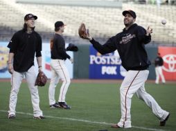 Los jugadores de Gigantes de San Francisco se preparan en una sesión de entretenimiento. AP  /