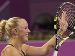 La tenista danesa Caroline Wozniacki está a punto de asegurar su número uno mundial. AFP  /