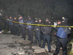 Un centenar de elementos policiacos habría acudido al lugar para resguardar la escena. ARCHIVO  /