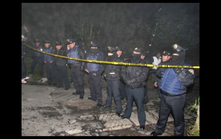 Un centenar de elementos policiacos habría acudido al lugar para resguardar la escena. ARCHIVO  /