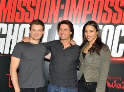 Cruise estuvo acompañado en la rueda de prensa por los actores Jeremy Renner y Paula Patton. AFP  /