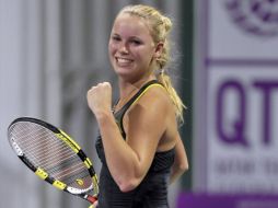 La tenista danesa Caroline Wozniacki, festejando la victoria en Doha. EFE  /