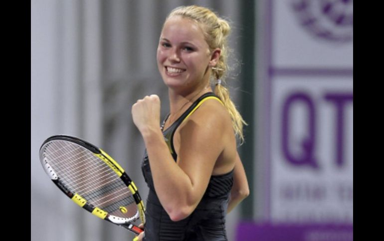 La tenista danesa Caroline Wozniacki, festejando la victoria en Doha. EFE  /