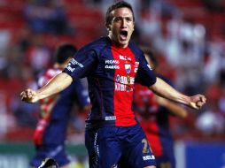 Amione celebra el primer gol del partido en la victoria del Atlante. MEXSPORT  /